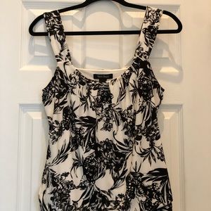 White House Black Market Black and white polyester and spandex floral top.